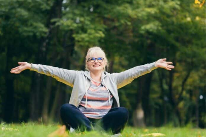 Senior woman exercising in the park