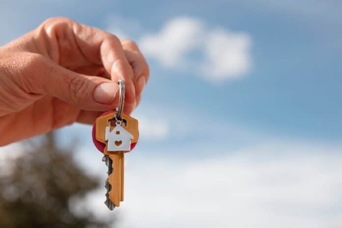 Person holding house keys